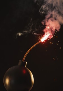 Old-fashioned explosive device ready to go off.
