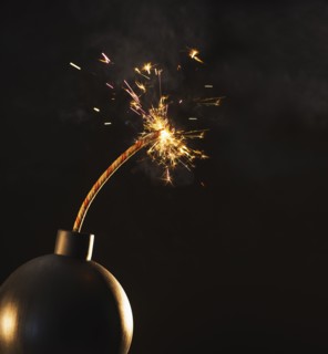 Old-fashioned explosive device ready to go off.