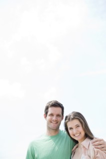 Portrait of happy young couple . Photo : Jamie Grill