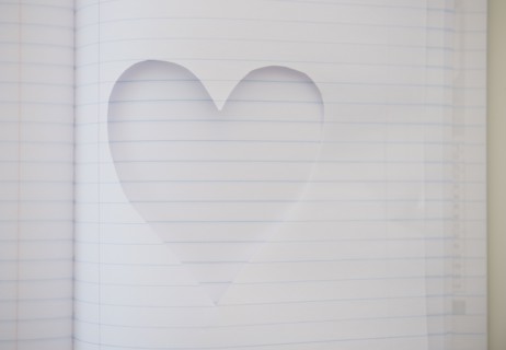 Heart shape cut out of note book. Photo : Jamie Grill