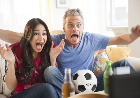 Couple watching tv. Photo: Jamie Grill