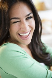 Portrait of happy young woman. Photo : Jamie Grill