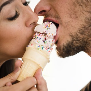 Couple eating ice cream together. Photo: Jamie Grill