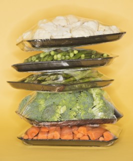 Studio shot of vegetables wrapped on trays. Photo: Daniel Grill