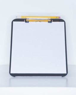 Studio shot of clear clipboard. Photo : Daniel Grill