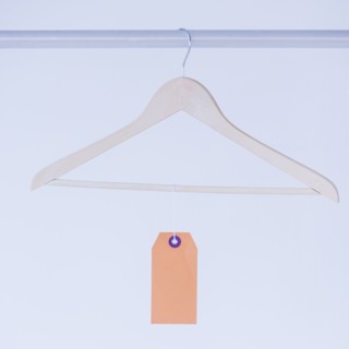 Studio shot of hanger with price tag. Photo : Daniel Grill
