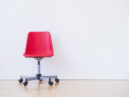 Studio shot of red office chair. Photo : Daniel Grill