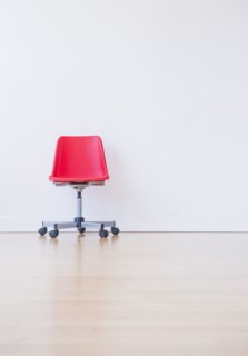 Studio shot of red office chair. Photo : Daniel Grill