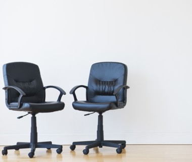 Studio shot of two black office chairs. Photo: Daniel Grill