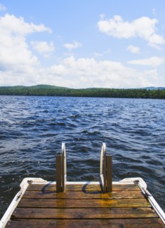 View of lake with wooden jetty. Photo : Daniel Grill