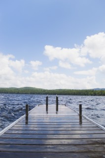 View of lake with wooden jetty. Photo : Daniel Grill