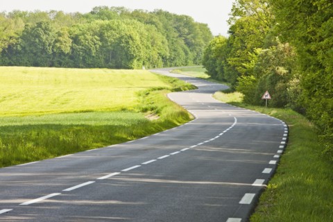 France, Rocroi, Road among green fields. Photo : Mike Kemp