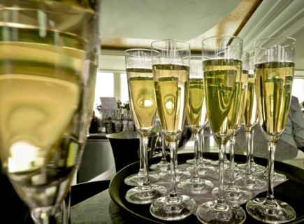 Chapmagne flutes on tray in restaurant. Photo : DKAR Images