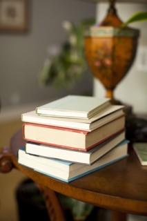 Stack of books on table. Photo : Jessica Peterson
