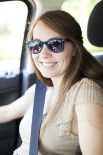 Portrait of young woman in car. Photo : Jessica Peterson