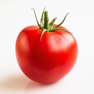 Tomato on white background, studio shot.
