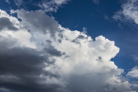 Puffy clouds on sky.