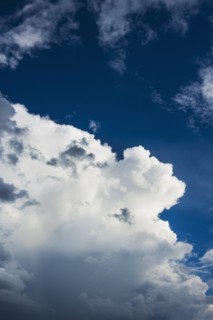 Puffy clouds on sky.