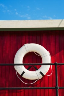 Close up of life belt on tugboat.
