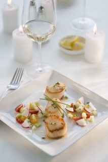Seafood on plate in restaurant.