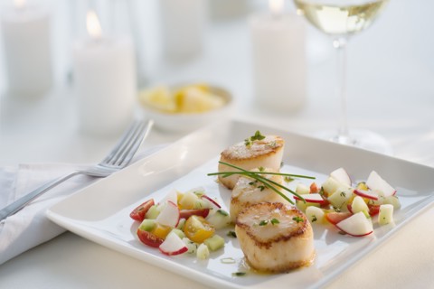 Seafood on plate in restaurant.