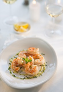 Seafood on plate in restaurant.