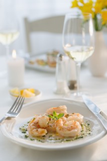 Seafood on plate in restaurant.