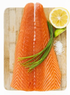 Close up of raw salmon meat, studio shot.