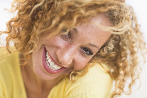 Portrait of smiling young woman.