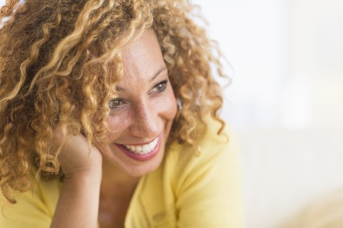 Portrait of smiling young woman.