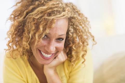 Portrait of smiling young woman.