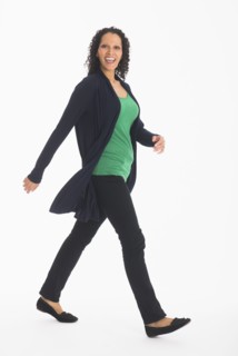 Studio shot of woman walking.