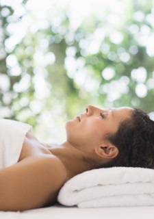 Woman relaxing in spa.