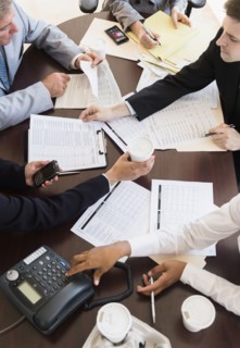 Office meeting in conference room. Photo : Jamie Grill