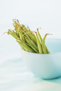 Studio shot of french green beans. Photo : Daniel Grill