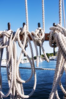 Coiled ropes on yacht deck. Photo : Daniel Grill