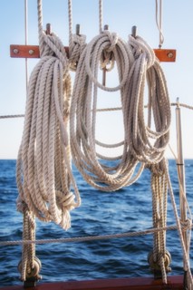 Coiled ropes on yacht deck. Photo : Daniel Grill