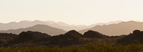 Several mountain ranges backlit by morning sun. Photo: Mike Kemp