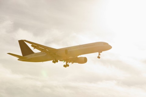 Commercial jet flying through air. Photo: Mike Kemp