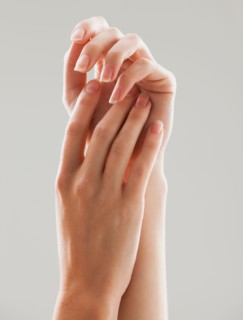Beautiful feminine human hands. Photo : Mike Kemp