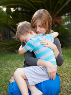 Mother hugging her son. Photo : Jessica Peterson