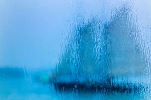 Schooner seen through wet window. Portland, Maine.
