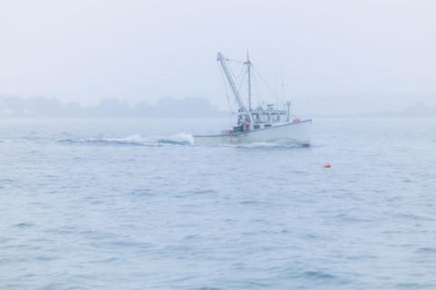 Lobster boat on sea. Portland, Maine.