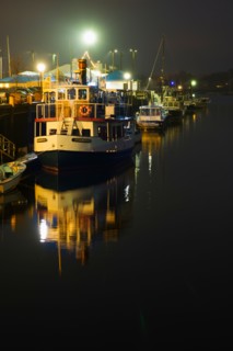 Boats in Harbor at night. Portland, Maine.