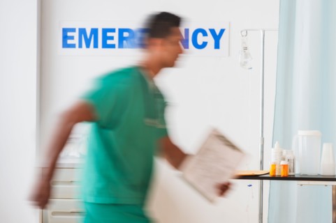 Surgeon entering emergency room.