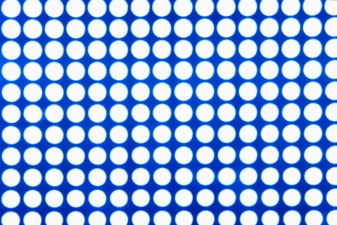 Spotted blue and white background.