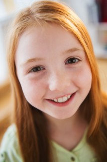 Portrait of smiling girl (8-9)