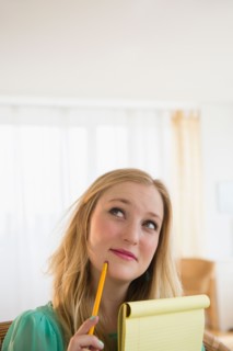 Portrait of young woman contemplating