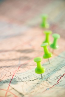 Thumbtacks on map