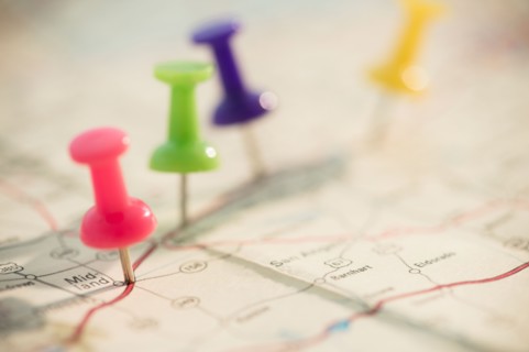 Thumbtacks on map
